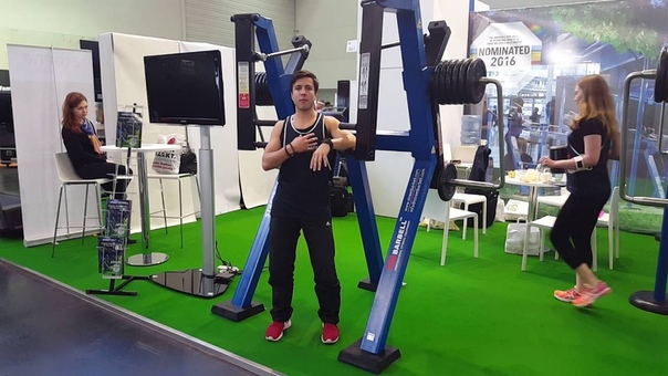 CONVERGENT CHEST PRESS IN STANDING POSITION MB 7. 52 STREET BARBELL LINE. How it