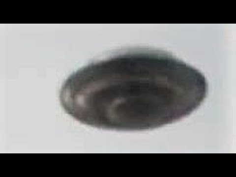 Real footage of a BEAMSHIP UFO caught on film in